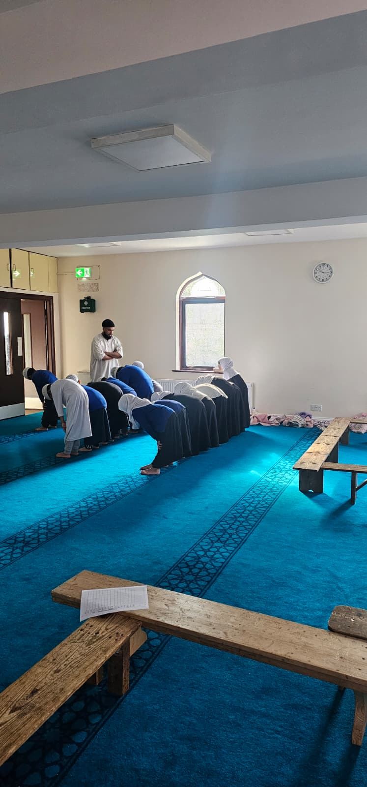 Pupils praying in the prayer hall