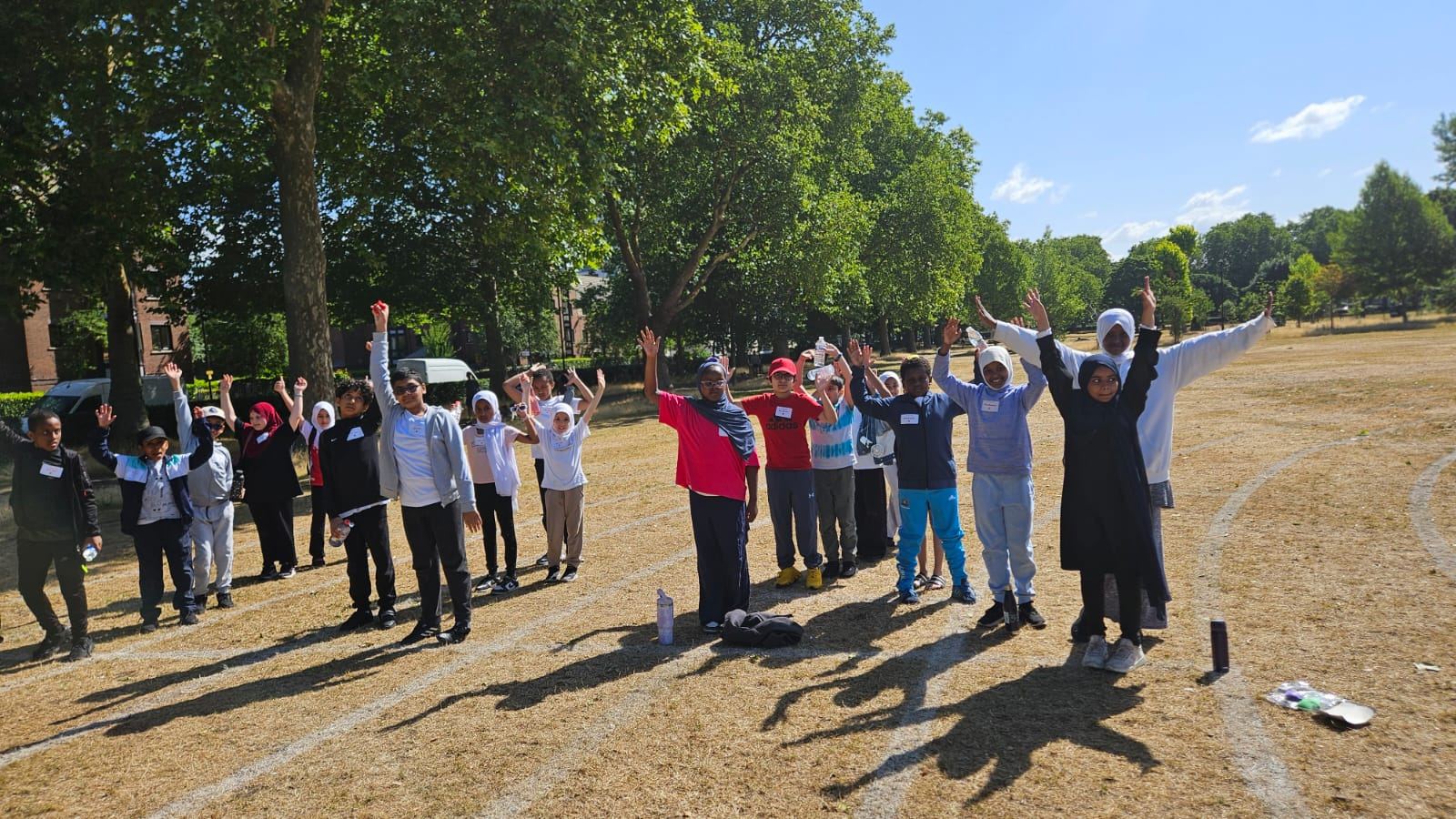 Pupils cheering together on Sports Day