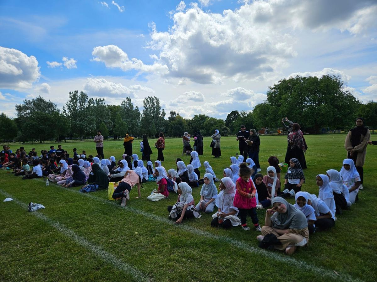 Pupils and families gathered on the field at Sports Day