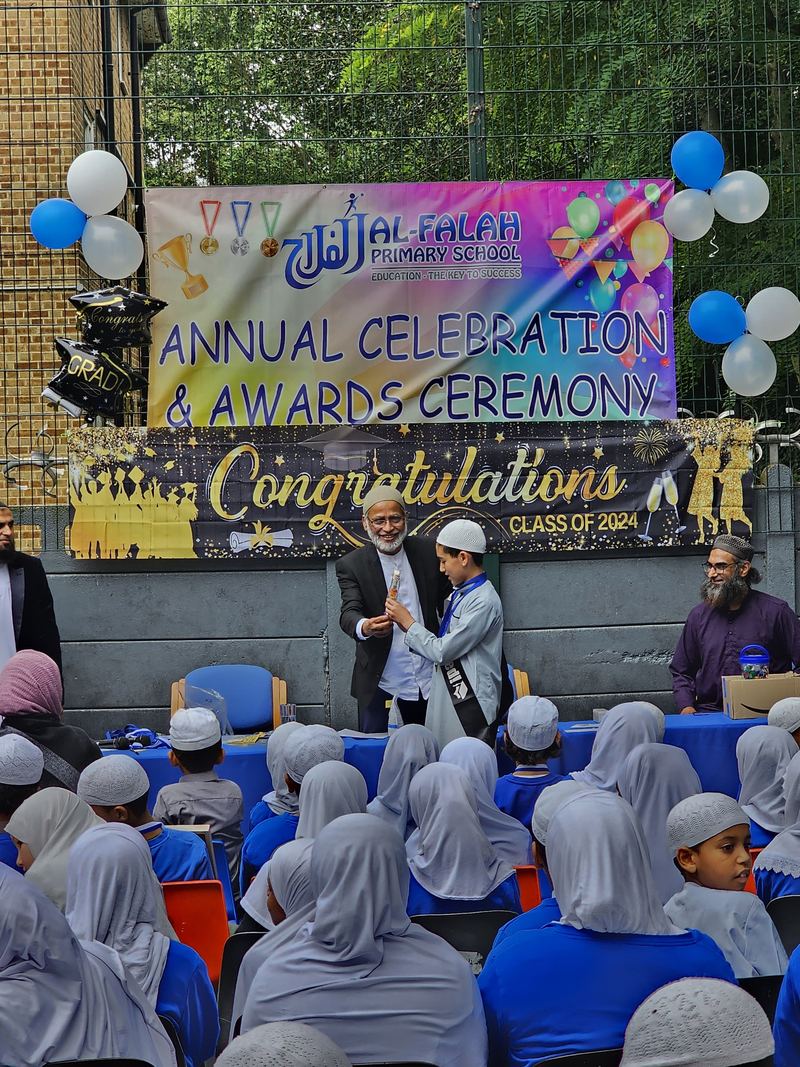 A pupil receiving an award at the Awards Ceremony